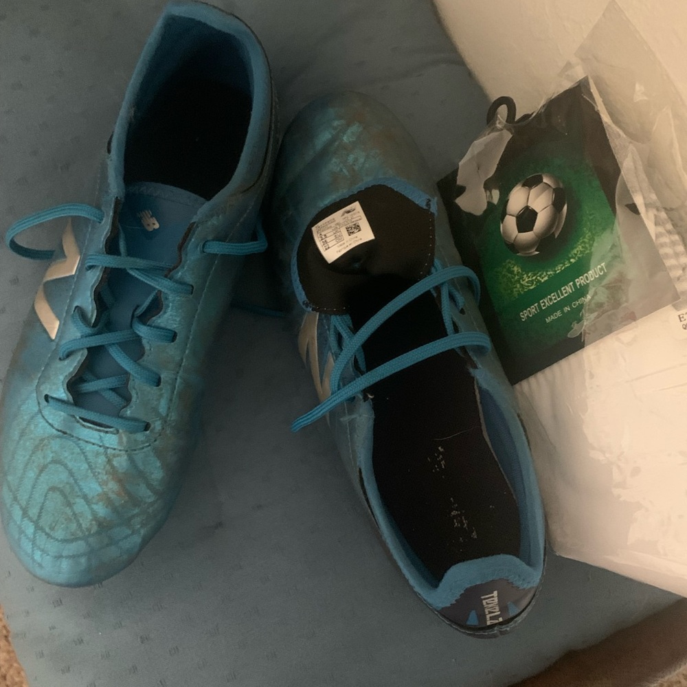 Unisex 4 Tekela v2 Pro Firm Ground cleets with pair Brazil socks never worn